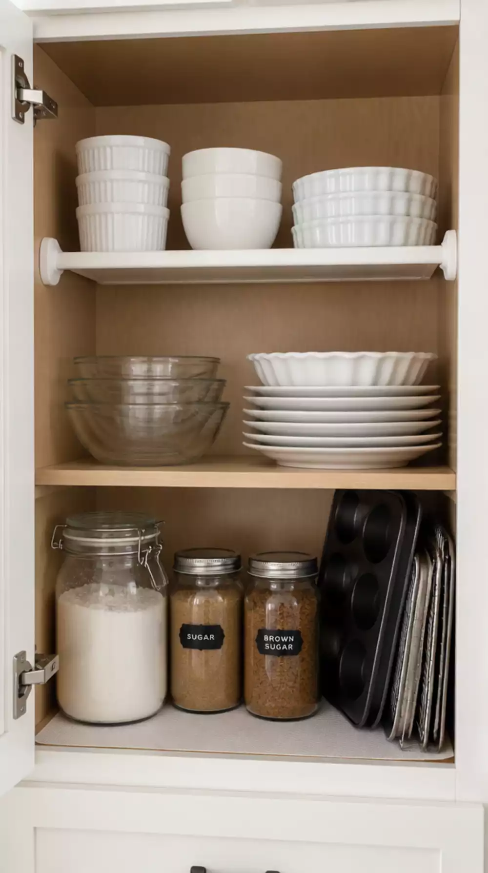 The Renter Kitchen Tension Shelf Trick That Adds an Extra Cabinet Shelf with No Drill